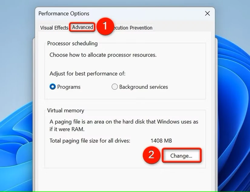 "Change" که در بخش "Virtual Memory" در پنجره "Performance Options" هایلایت شده است.